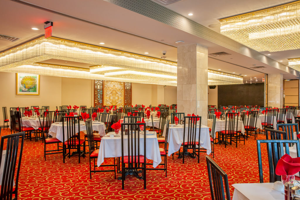 China Garden Han Gong designed banquet hall with a striking red carpet and white tables, great place for party and private event