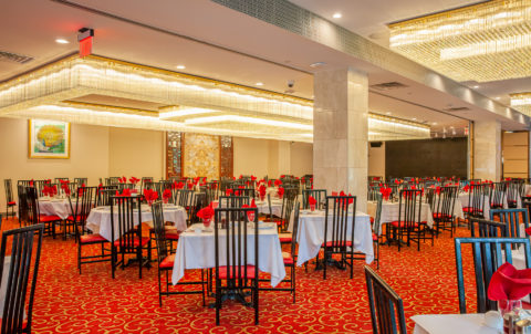 China Garden Han Gong designed banquet hall with a striking red carpet and white tables, great place for party and private event